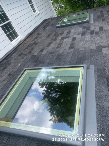 Skylights-installed-below-roof-pitch-requirements-replaced-with-VELUX-Deck-Mounted-Units.-Raleigh-NC-qj6o4n87co1rkrqnyjjda1j067f0b3jc41iptis5c0