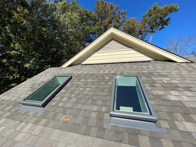 Bubbled acrylic skylights replaced with VELUX Fixed Curb Mounted units