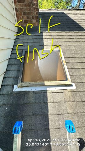 Replacement of self/pan flashed skylight with new VELUX flat glass unit