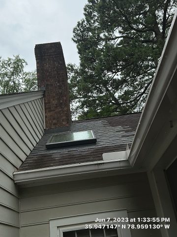 Replacement of self/pan flashed skylight with new VELUX flat glass unit